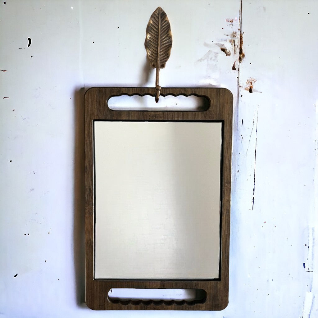 This banana leaf brass hook in antique is perfect to hang your bamboo mirror on.