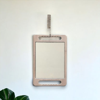 The stylish comb brass hook in silver is a great way to hang your handheld eco-friendly mirror.