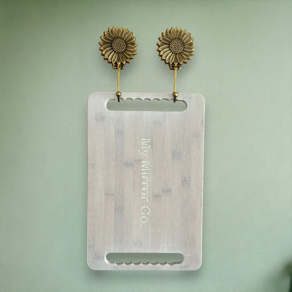 Golden sunflower brass hooks look amazing against any wall.