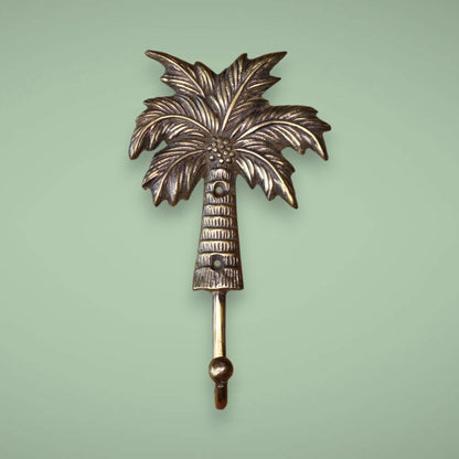 Create style and space with our palm tree brass hook in antique on any wall.