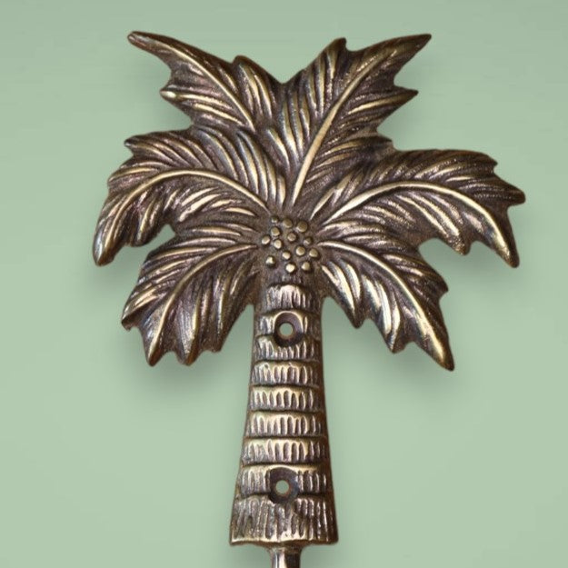 The palm tree antique brass hook.