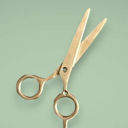 Shine bright with our brass scissor hook in gold.