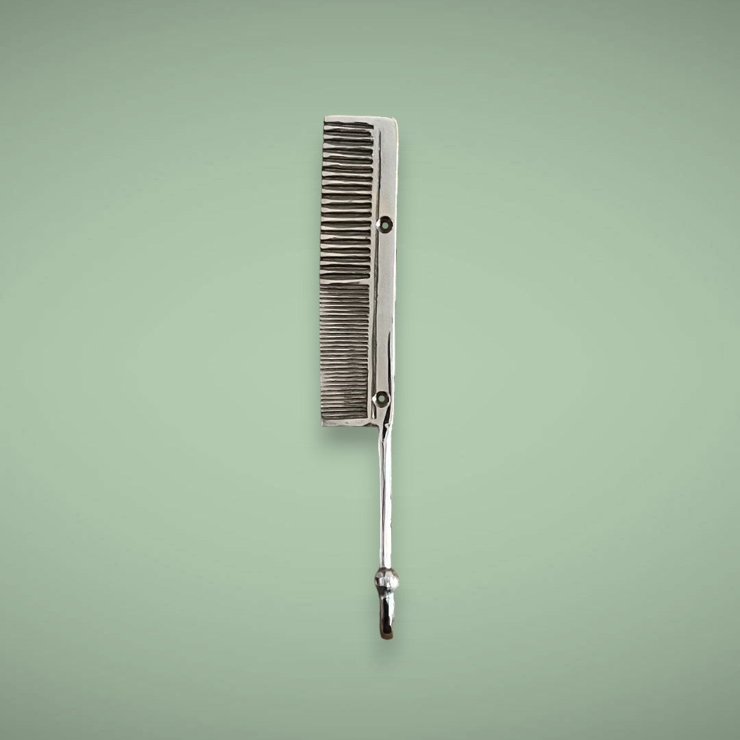 Our custom brass comb hook in a silver finish.