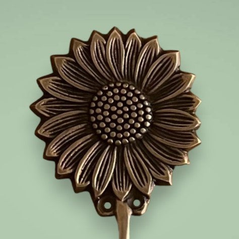 Our beautiful sunflower with an antique finish.